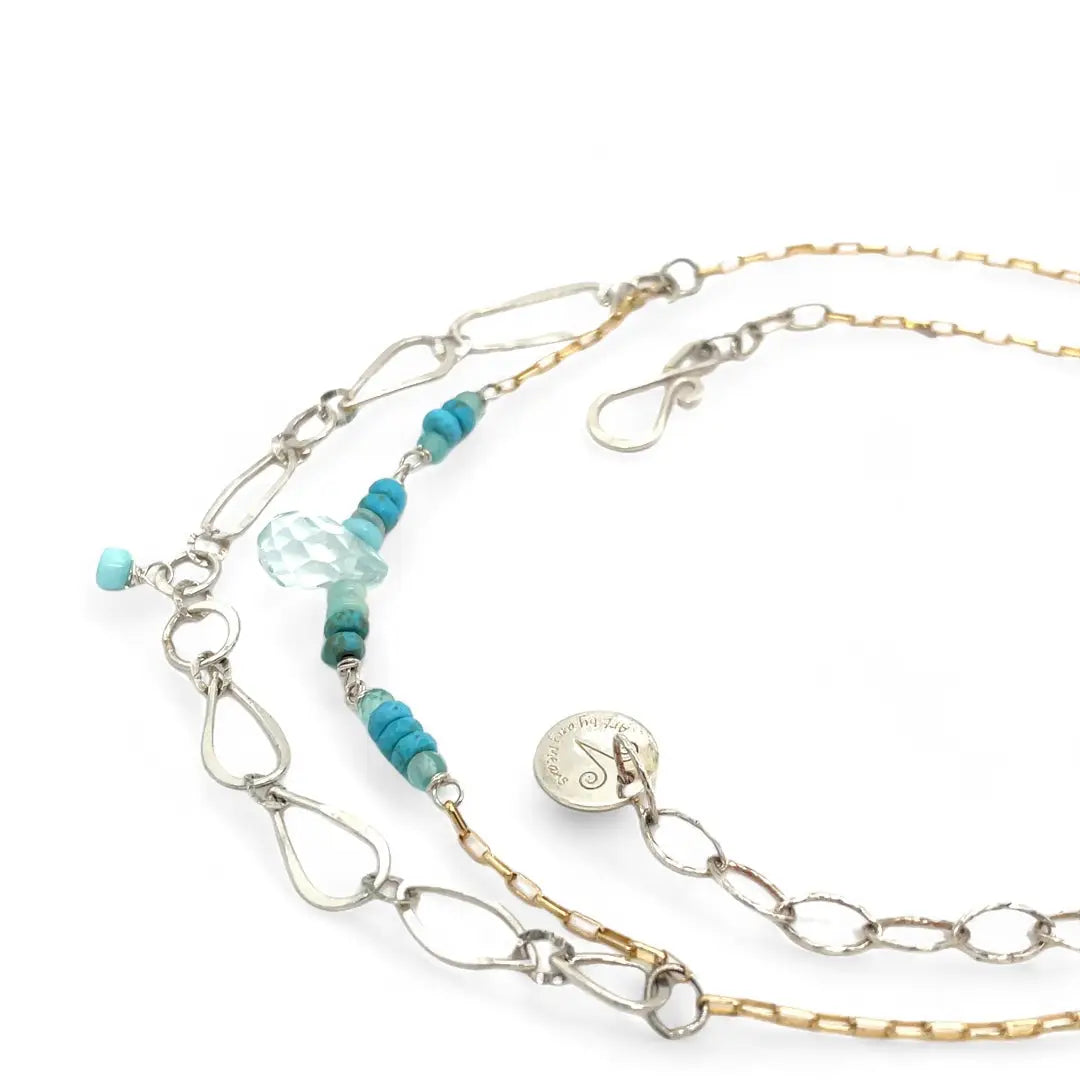 A handmade hammered sterling silver link double chain necklace with gold filled delicate chain, turquoise, blue quartz, and opal gemstones