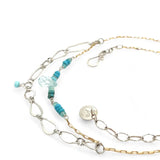 A handmade hammered sterling silver link double chain necklace with gold filled delicate chain, turquoise, blue quartz, and opal gemstones