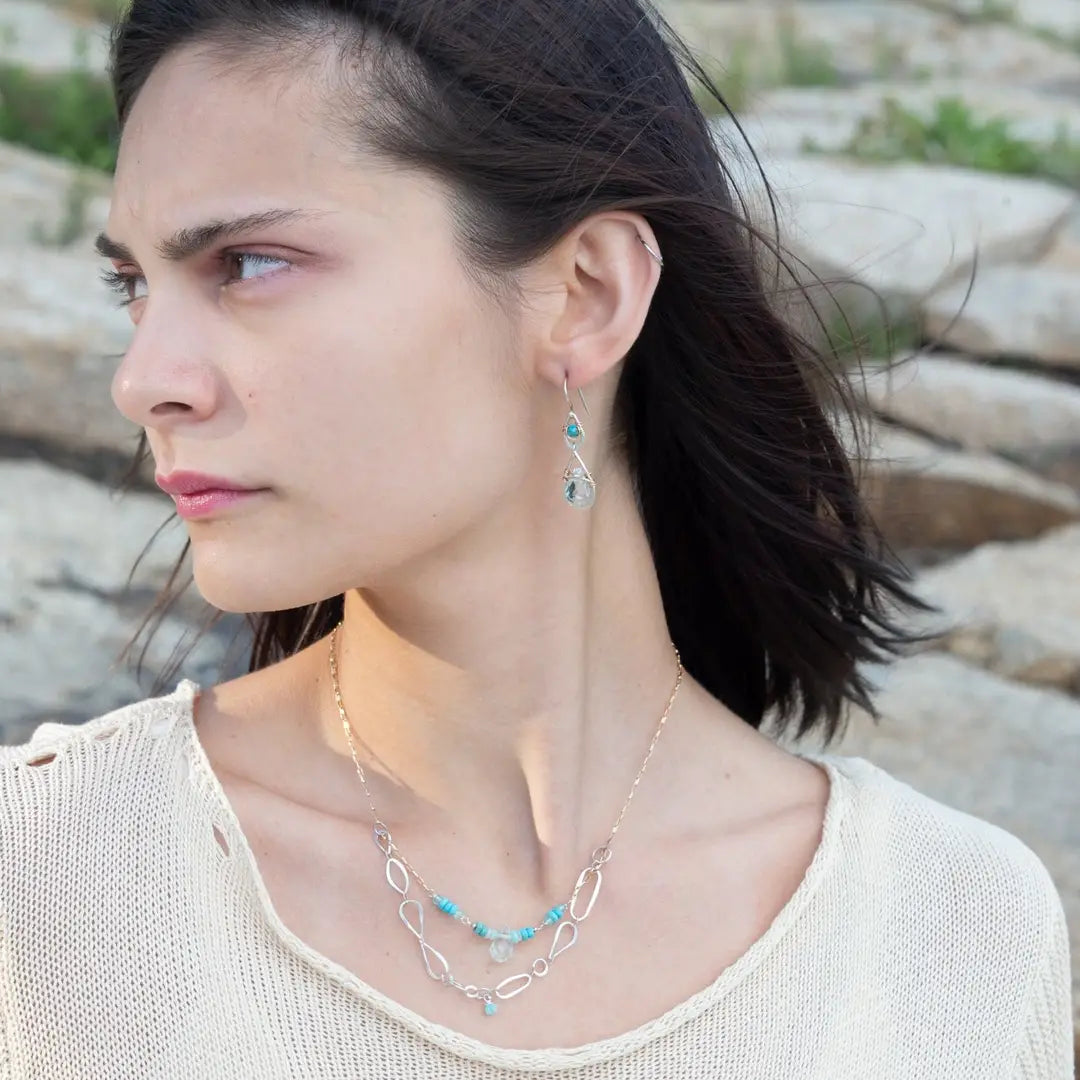 A handmade hammered sterling silver link double chain necklace with gold filled delicate chain, turquoise, blue quartz, and opal gemstones