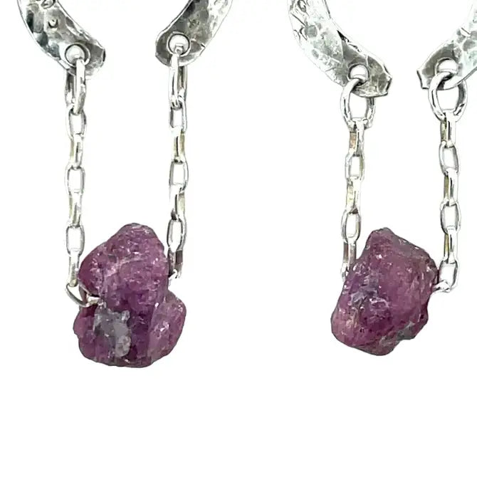 raw ruby nugget gemstones on sterling silver chain hanging from sterling silver horseshoe shaped earrings