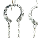 raw ruby nugget gemstones on sterling silver chain hanging from sterling silver horseshoe shaped earrings