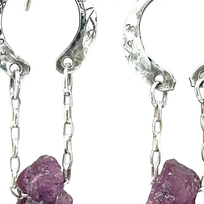 raw ruby nugget gemstones on sterling silver chain hanging from sterling silver horseshoe shaped earrings
