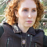 raw ruby nugget gemstones on sterling silver chain hanging from sterling silver horseshoe shaped earrings