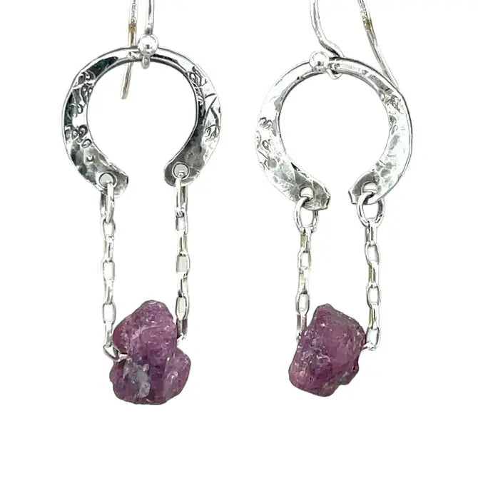 raw ruby nugget gemstones on sterling silver chain hanging from sterling silver horseshoe shaped earrings