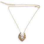 Brass textured pendant with fresh water pearl center, accented with rutilated quartz gemstones on gold filled delicate chain necklace