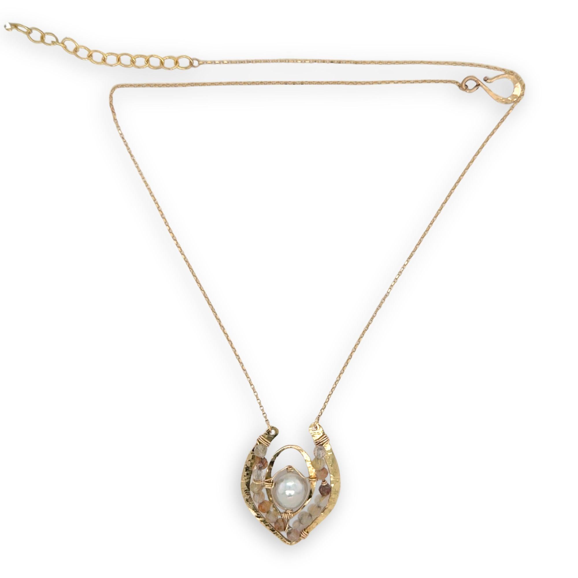 Brass textured pendant with fresh water pearl center, accented with rutilated quartz gemstones on gold filled delicate chain necklace