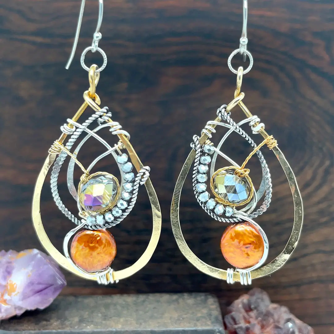 Handmade hammered brass drop earrings with rust orange fresh water pearl coins, crystal, and pyrite accents on sterling silver, oxidized sterling twist, gold-filled and brass twist wires