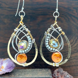 Handmade hammered brass drop earrings with rust orange fresh water pearl coins, crystal, and pyrite accents on sterling silver, oxidized sterling twist, gold-filled and brass twist wires