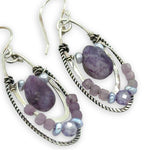 Smooth sugilite drops are held inside sterling silver and oxidized sterling twist channel mini hoops lined with amethyst, fresh water pearl, and cubic zirconia