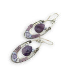 Smooth sugilite drops are held inside sterling silver and oxidized sterling twist channel mini hoops lined with amethyst, fresh water pearl, and cubic zirconia