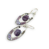 Smooth sugilite drops are held inside sterling silver and oxidized sterling twist channel mini hoops lined with amethyst, fresh water pearl, and cubic zirconia
