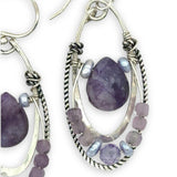 Smooth sugilite drops are held inside sterling silver and oxidized sterling twist channel mini hoops lined with amethyst, fresh water pearl, and cubic zirconia