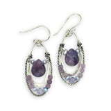 Smooth sugilite drops are held inside sterling silver and oxidized sterling twist channel mini hoops lined with amethyst, fresh water pearl, and cubic zirconia