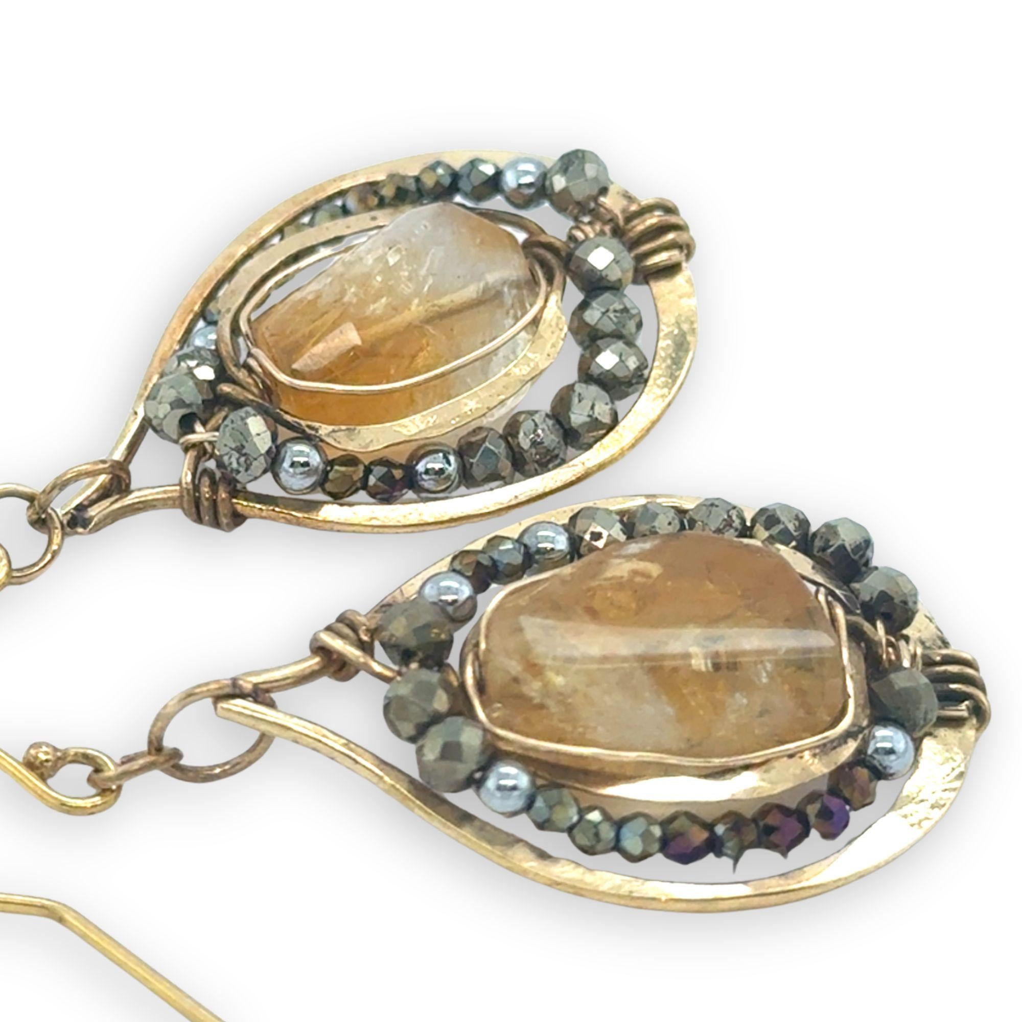brass hammered drop earrings with citrine nuggets surrounded by crystal and pyrite gemstones on gold filled earring hooks