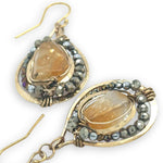 brass hammered drop earrings with citrine nuggets surrounded by crystal and pyrite gemstones on gold filled earring hooks
