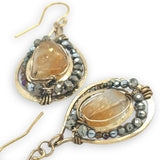 brass hammered drop earrings with citrine nuggets surrounded by crystal and pyrite gemstones on gold filled earring hooks