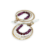 Stamped double bronze mini hoop earrings lined with two types of garnet faceted gemstones on sterling silver earring hooks