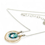 Mini sterling silver hammered ring pendant with ripples of hammered brass filled with chryscocolla and a chalcedony faceted mini drop gemstone necklace