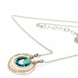 Mini sterling silver hammered ring pendant with ripples of hammered brass filled with chryscocolla and a chalcedony faceted mini drop gemstone necklace