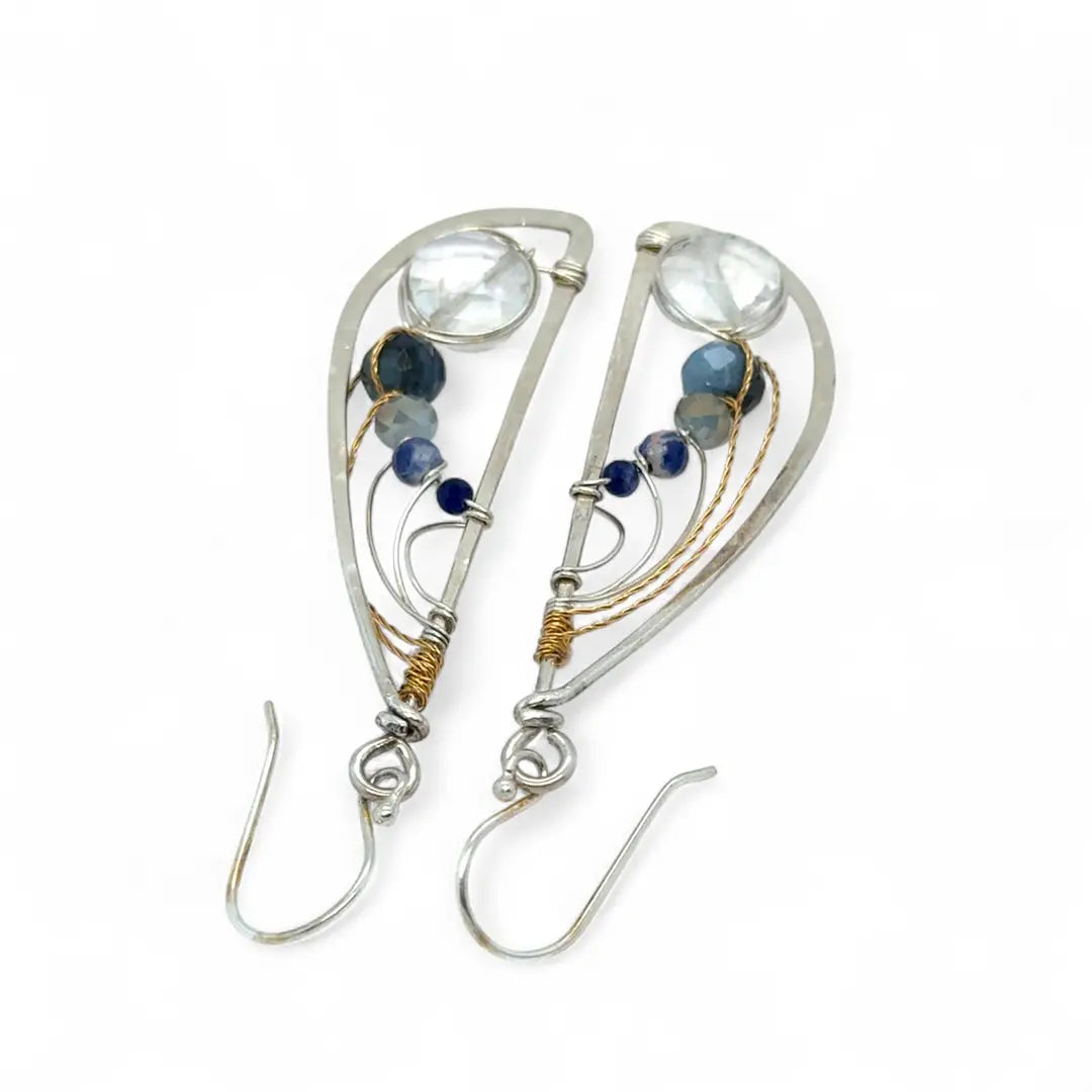 Sterling silver hammered wing earrings with quartz coin, aquamarine, crystal, and sodalite faceted gemstones with brass twist accents