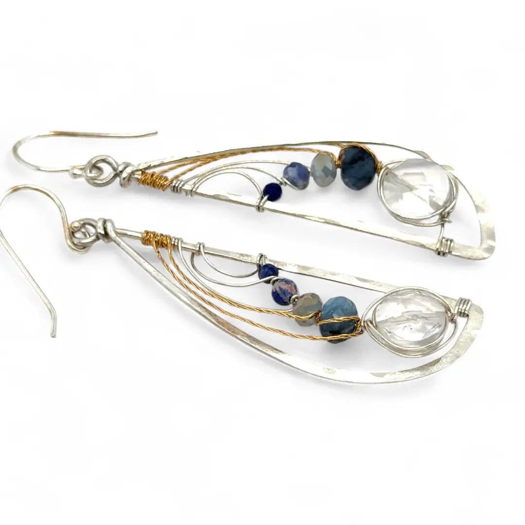 Sterling silver hammered wing earrings with quartz coin, aquamarine, crystal, and sodalite faceted gemstones with brass twist accents