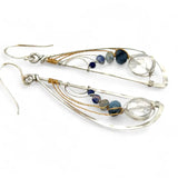 Sterling silver hammered wing earrings with quartz coin, aquamarine, crystal, and sodalite faceted gemstones with brass twist accents