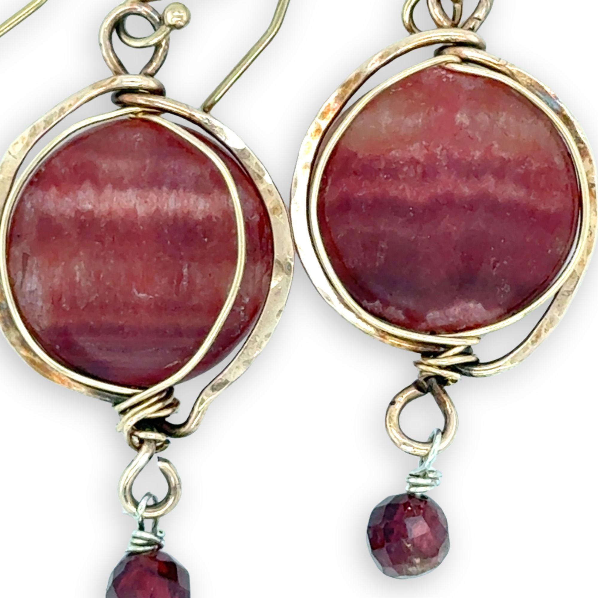 Red striped agate coins are held in hammered bronze wire earrings with garnet and gold filled accents