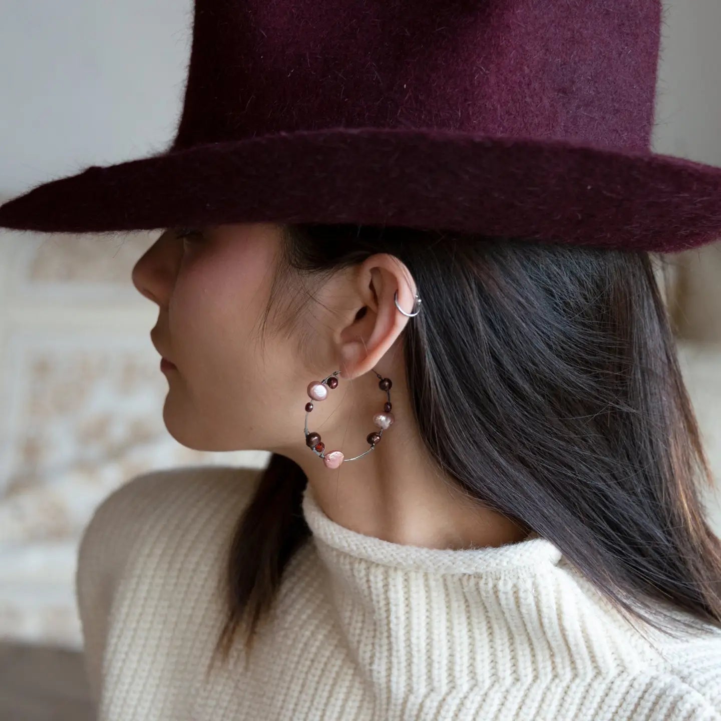 Oxidized sterling silver hoop earring with pink and deep red fresh water pearls and garnet gemstones