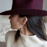 Oxidized sterling silver hoop earring with pink and deep red fresh water pearls and garnet gemstones