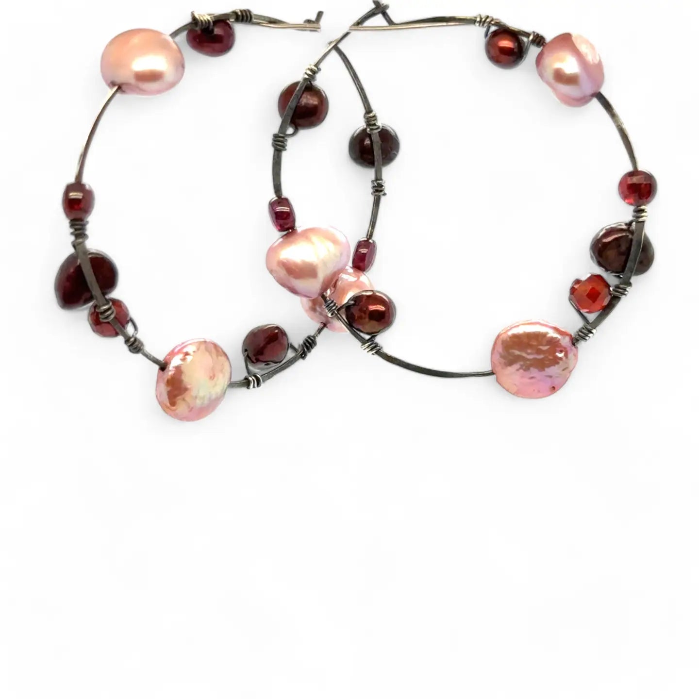 Oxidized sterling silver hoop earring with pink and deep red fresh water pearls and garnet gemstones