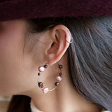 Oxidized sterling silver hoop earring with pink and deep red fresh water pearls and garnet gemstones