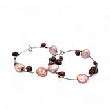 Oxidized sterling silver hoop earring with pink and deep red fresh water pearls and garnet gemstones