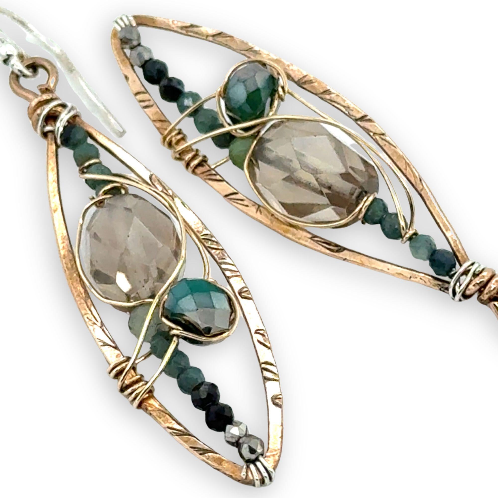 Bronze stamped marquise shaped earrings with smokey quartz, blue tourmaline, and green agate gemstones held within gold-filled wire