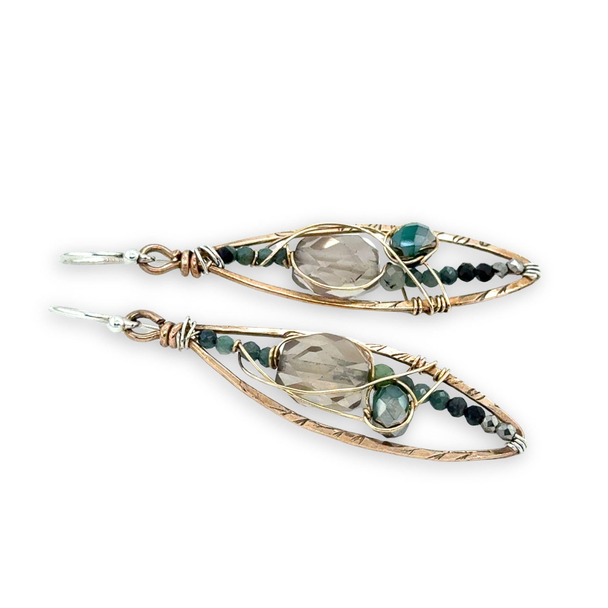 Bronze stamped marquise shaped earrings with smokey quartz, blue tourmaline, and green agate gemstones held within gold-filled wire
