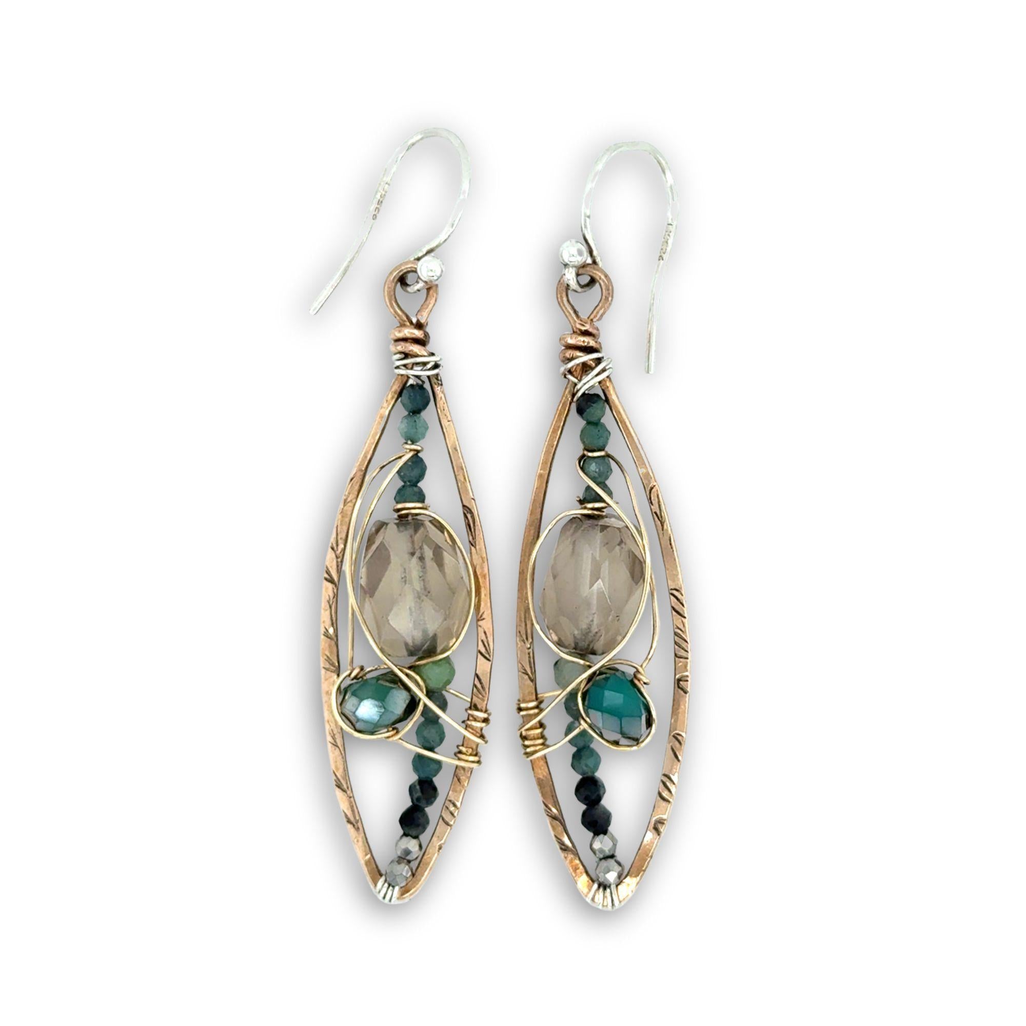 Bronze stamped marquise shaped earrings with smokey quartz, blue tourmaline, and green agate gemstones held within gold-filled wire