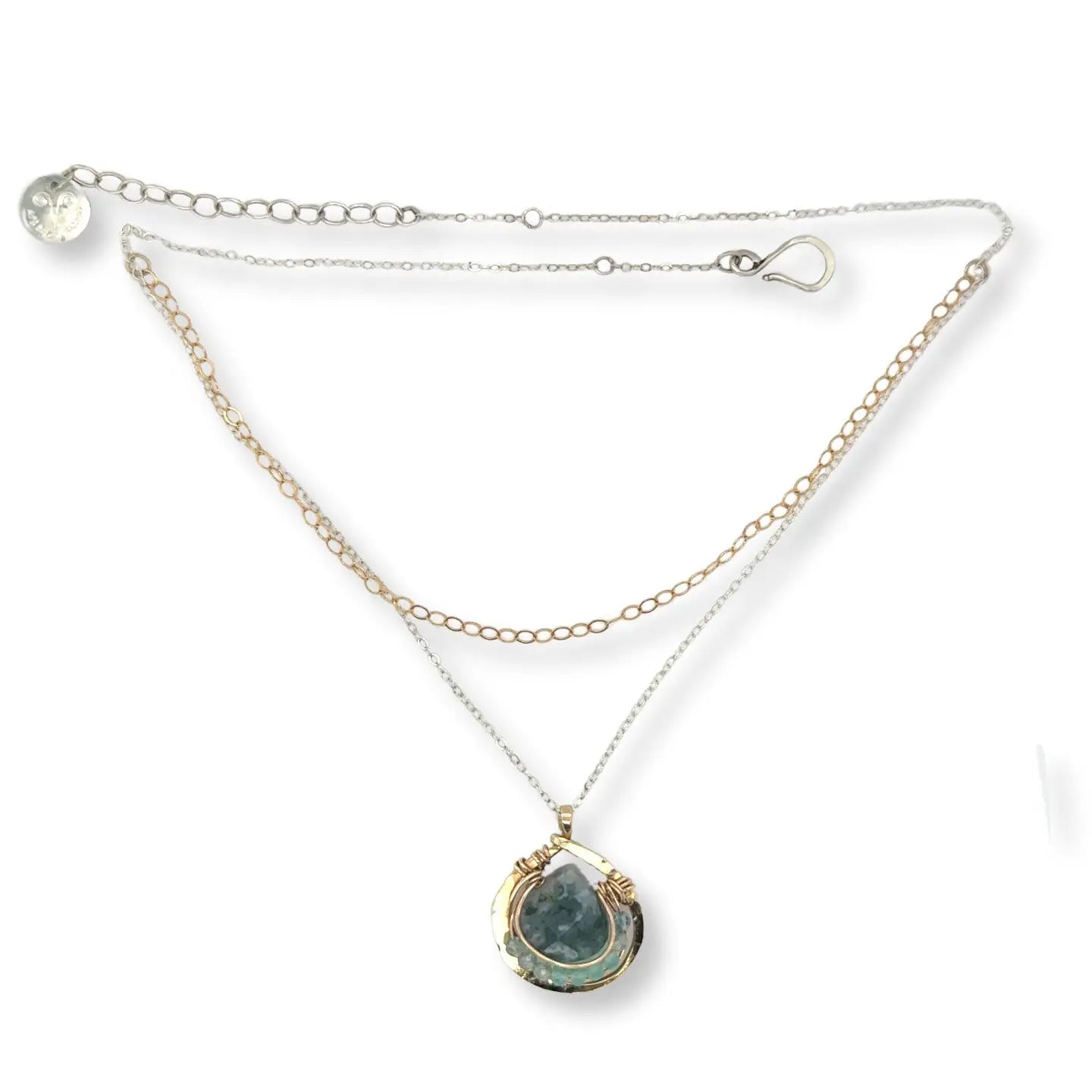 brass mini teardrop necklace filled with chalcedony and apatite gemstones surrounding a moss agate faceted drop gemstone in gold filled wire on a double mixed metal chain
