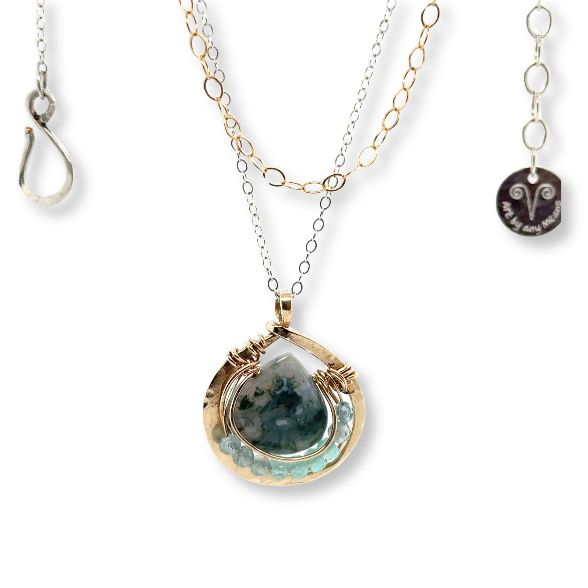 brass mini teardrop necklace filled with chalcedony and apatite gemstones surrounding a moss agate faceted drop gemstone in gold filled wire on a double mixed metal chain