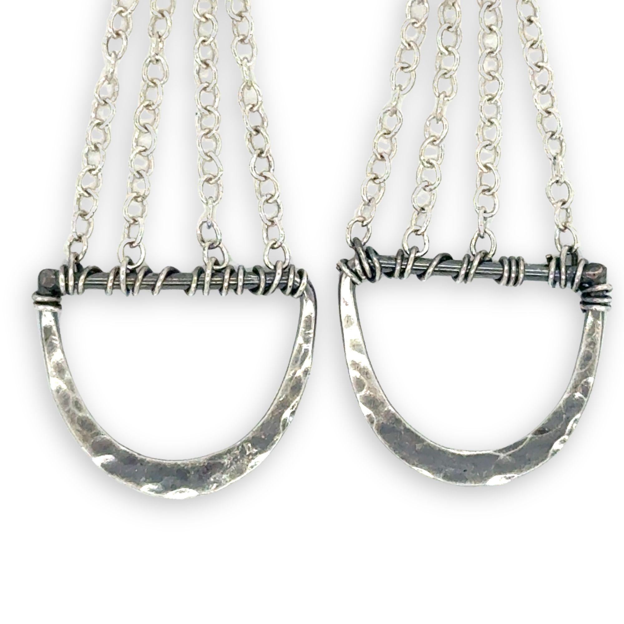 darkened hammered sterling semi circles hanging from layers of sterling silver delicate chain earrings