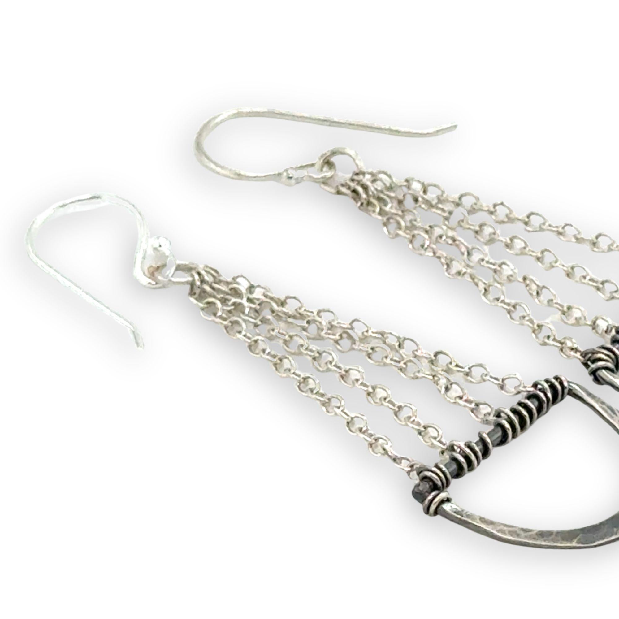 darkened hammered sterling semi circles hanging from layers of sterling silver delicate chain earrings