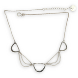 three darkened hammered sterling semi circles are interspersed with shiny sterling silver triple up delicate chain necklace
