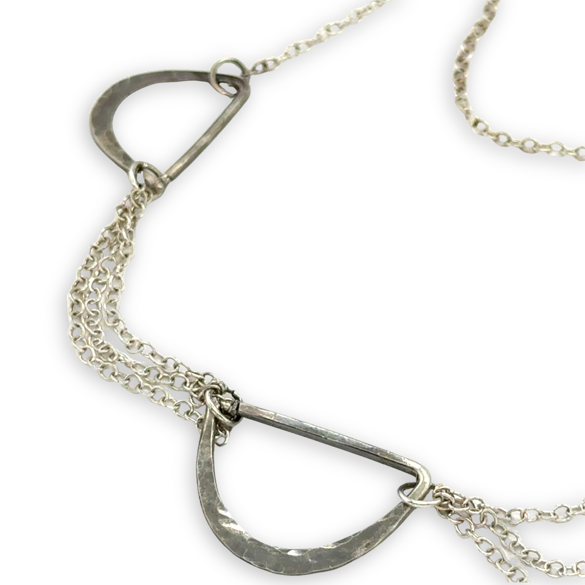 three darkened hammered sterling semi circles are interspersed with shiny sterling silver triple up delicate chain necklace