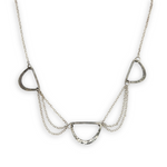 three darkened hammered sterling semi circles are interspersed with shiny sterling silver triple up delicate chain necklace