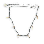 handmade hammered and twisted darkened sterling silver bars attached with gold filled rings accented with gold filled paddle charm necklace