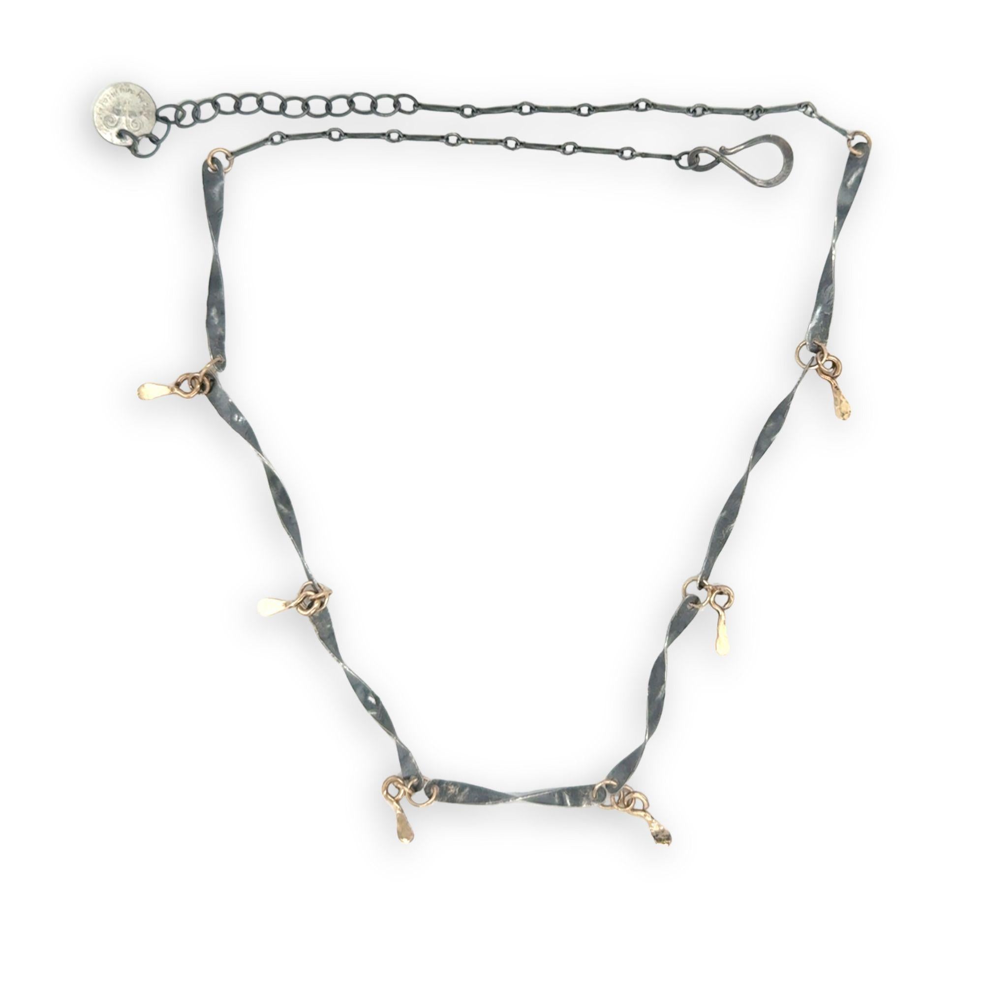 handmade hammered and twisted darkened sterling silver bars attached with gold filled rings accented with gold filled paddle charm necklace