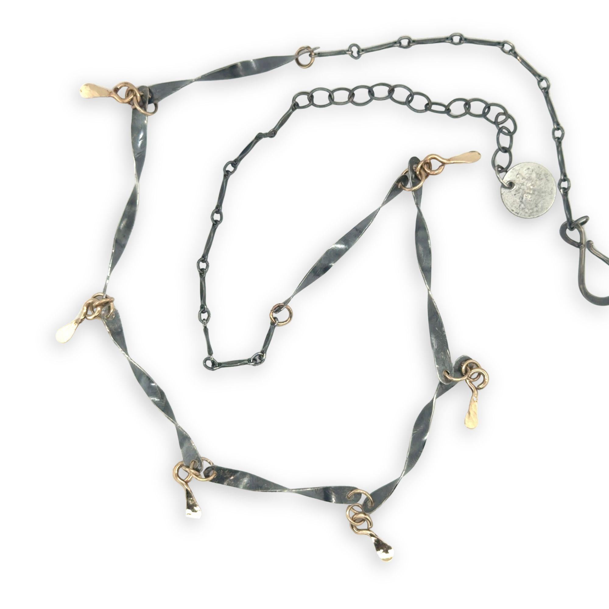 handmade hammered and twisted darkened sterling silver bars attached with gold filled rings accented with gold filled paddle charm necklace