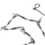 handmade hammered and twisted darkened sterling silver bars attached with gold filled rings accented with gold filled paddle charm necklace