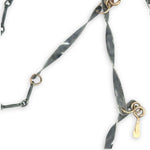 handmade hammered and twisted darkened sterling silver bars attached with gold filled rings accented with gold filled paddle charm necklace