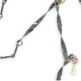 handmade hammered and twisted darkened sterling silver bars attached with gold filled rings accented with gold filled paddle charm necklace