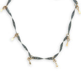 handmade hammered and twisted darkened sterling silver bars attached with gold filled rings accented with gold filled paddle charm necklace