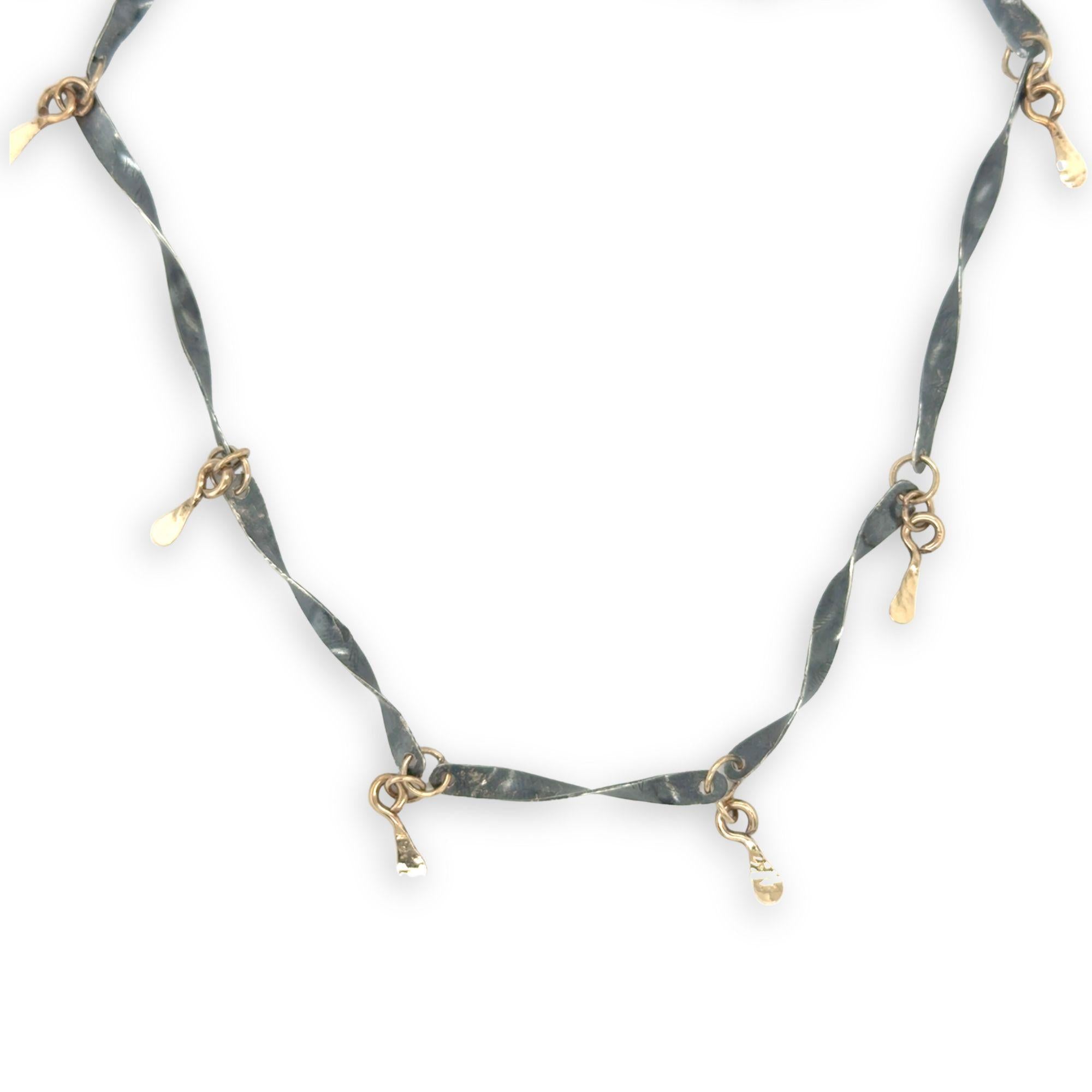 handmade hammered and twisted darkened sterling silver bars attached with gold filled rings accented with gold filled paddle charm necklace